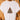 White t-shirt with a Christmas tree design made of books on a wooden hanger.